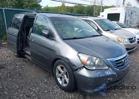 2010 Honda Odyssey Ex-L z USA, uszkodzony, nr VIN 5FNRL3H70AB021452
